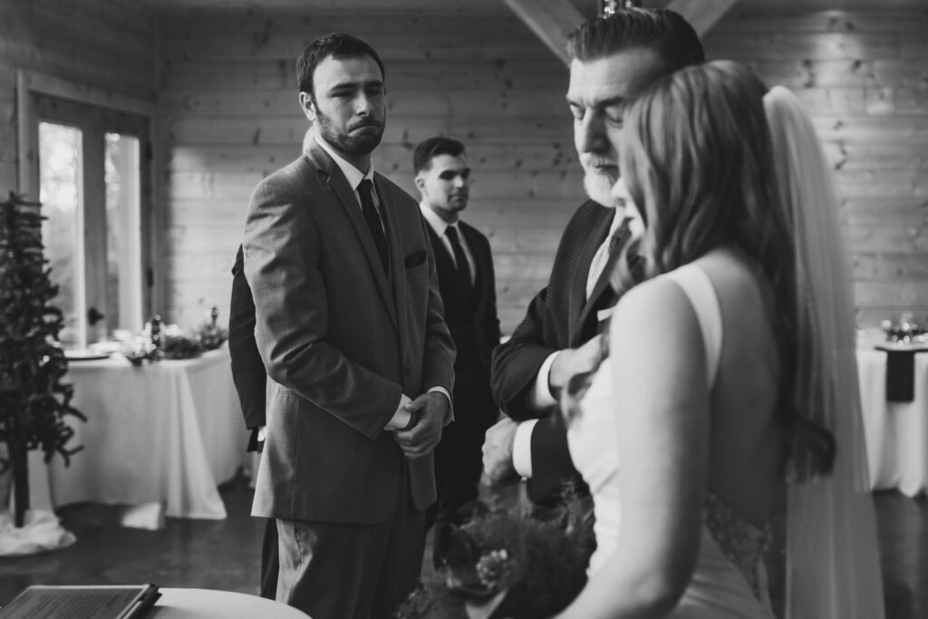 Groom’s raw reaction captured as he stands at the altar seeing his partner for the first time.