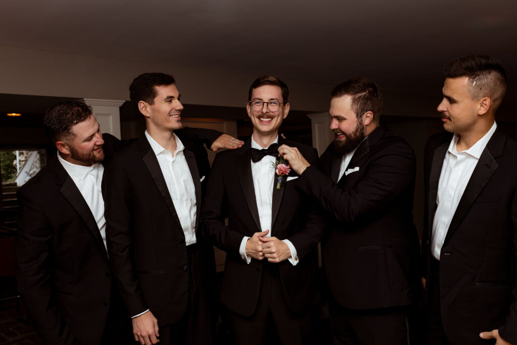 Elegant wedding details and couples portraits at Haseltine Estate, featuring soft pink tones and timeless romance