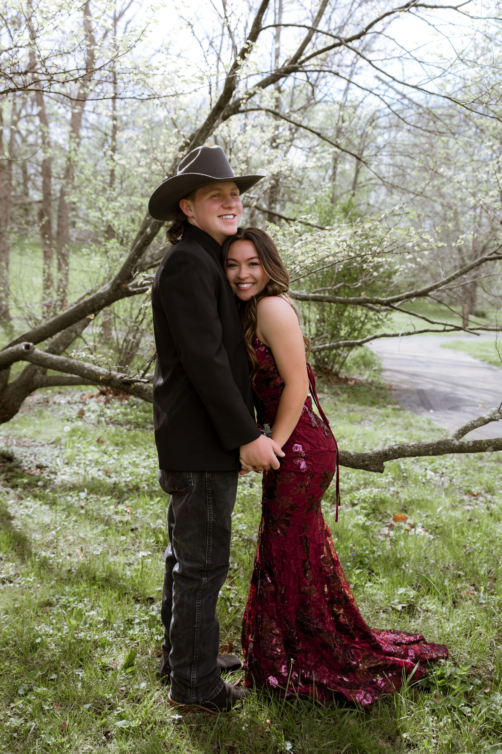 Marshfield Missouri prom photos at Hidden Waters Nature Park featuring a high school couple in formal attire with natural light candid portrait photography by a Missouri photographer