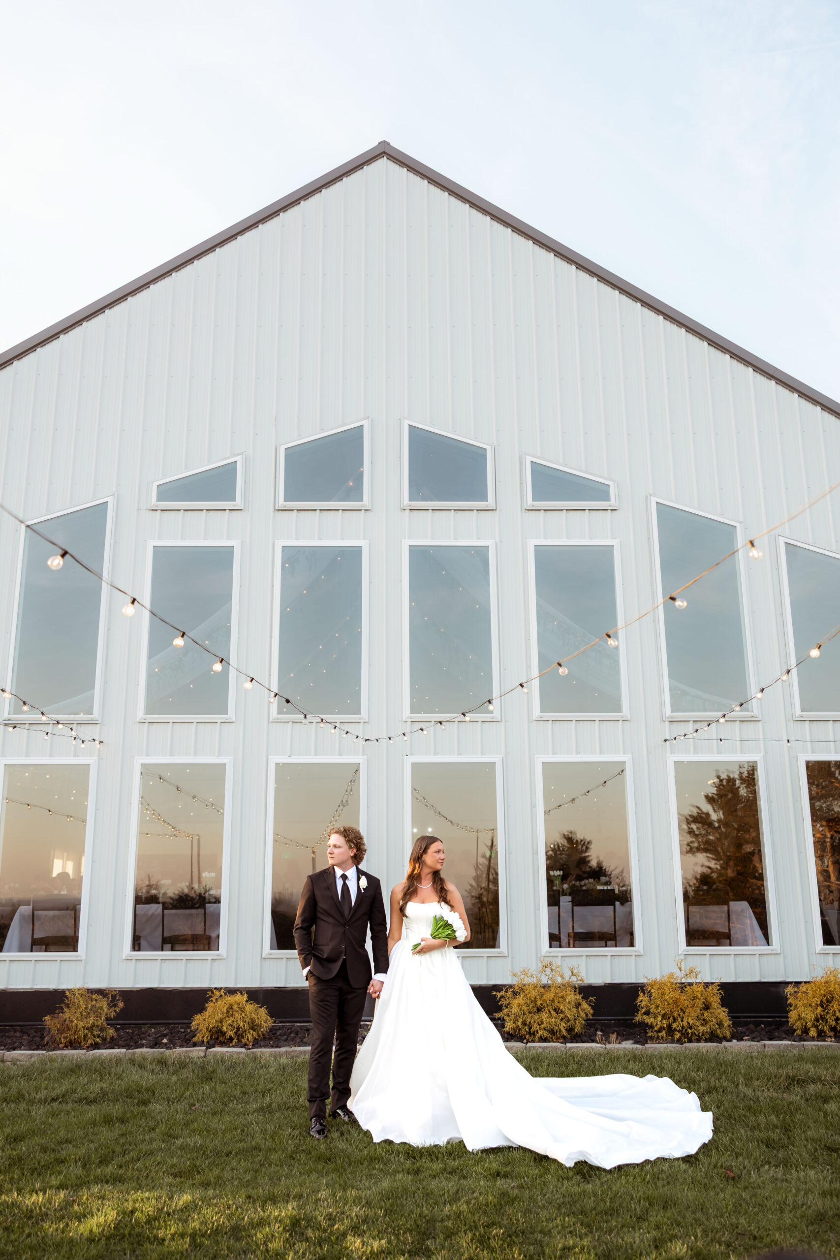 Black tie spring wedding at The Atrium in Branson Missouri with natural light, emotional moments, and elegant details photographed by a Missouri wedding photographer