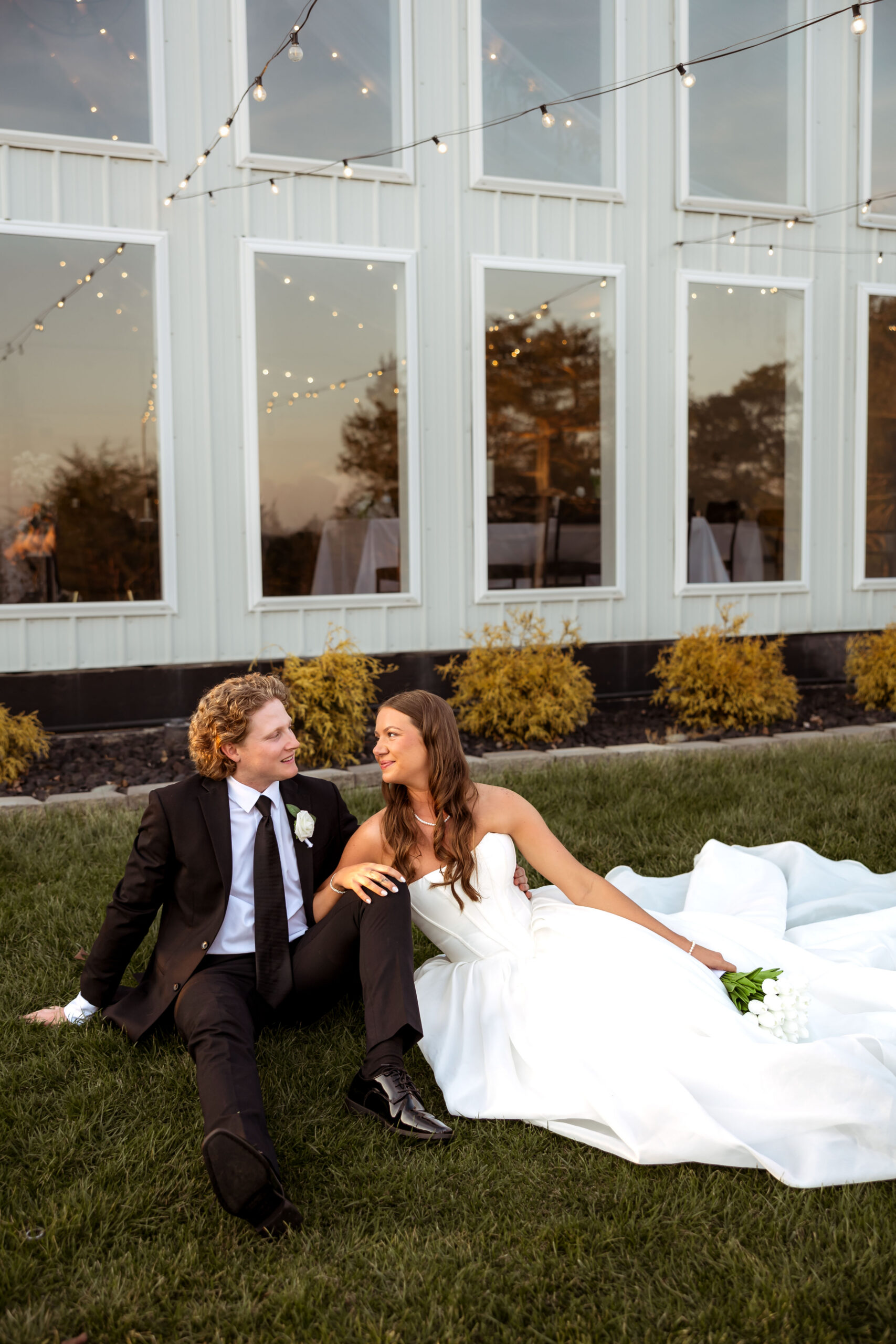 Black tie spring wedding at The Atrium in Branson Missouri with natural light, emotional moments, and elegant details photographed by a Missouri wedding photographer