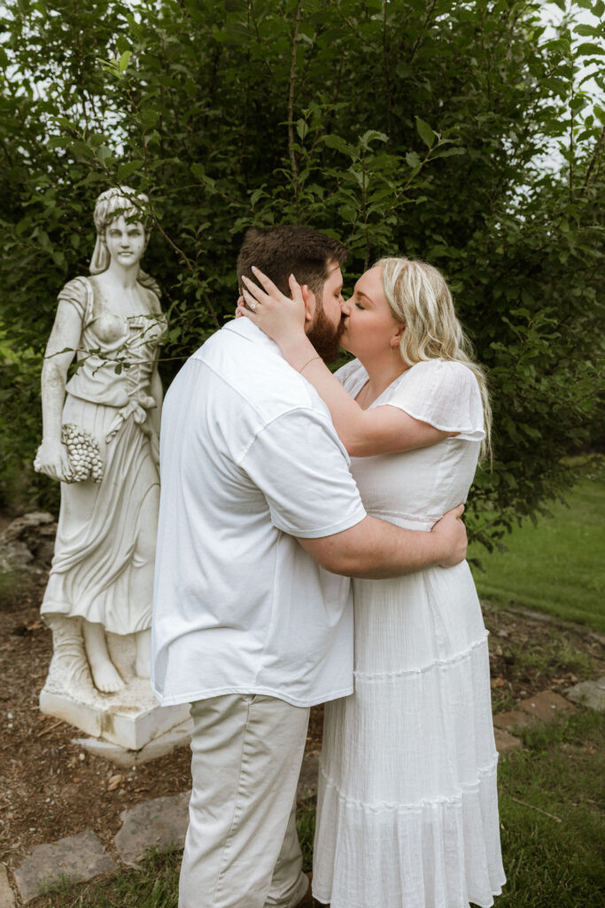 Engaged couple at Nathanael Greene Park in Springfield Missouri photographed by Katey Sutton Photo