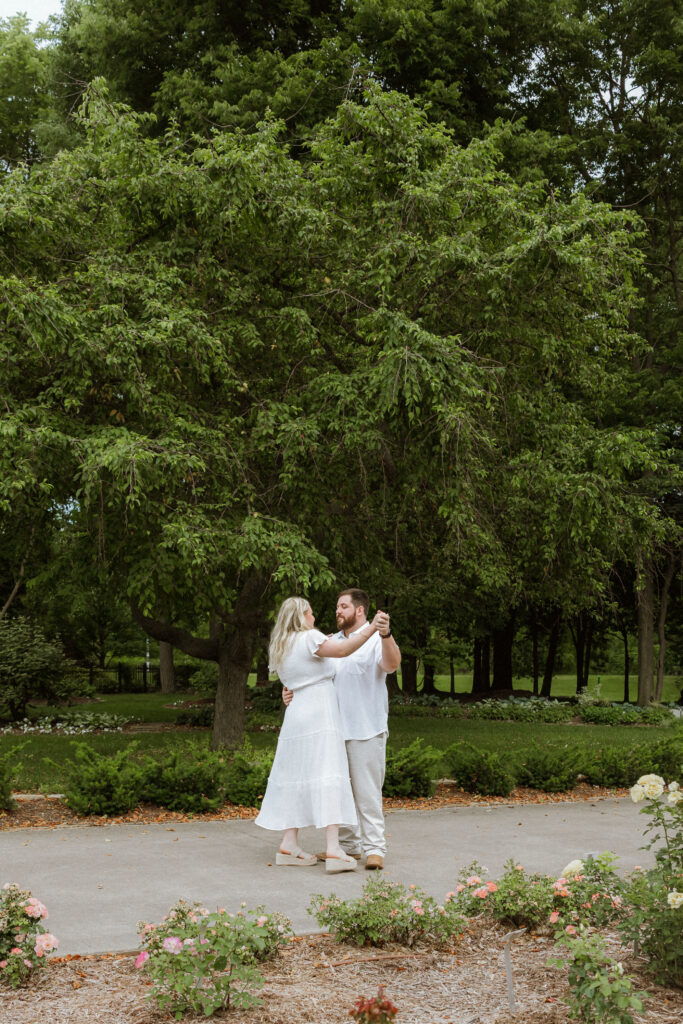 Engaged couple at Nathanael Greene Park in Springfield Missouri photographed by Katey Sutton Photo